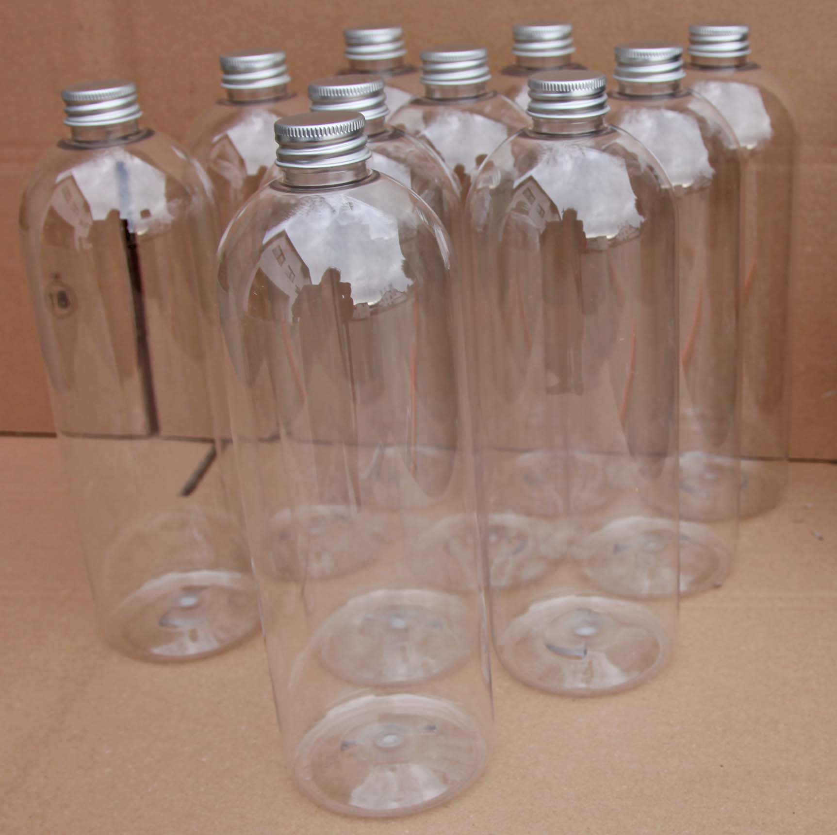 KA-5810-StueckShop-webgroesse PET-Flasche 1Liter klar (10 Stück) Mit Deckel silberfarben